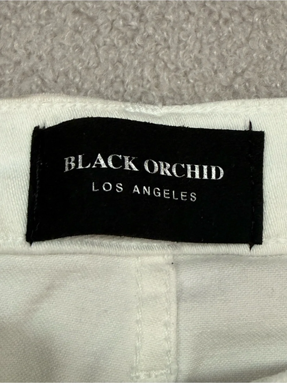 Black Orchid White Denim Jeans with Branded Waist Label